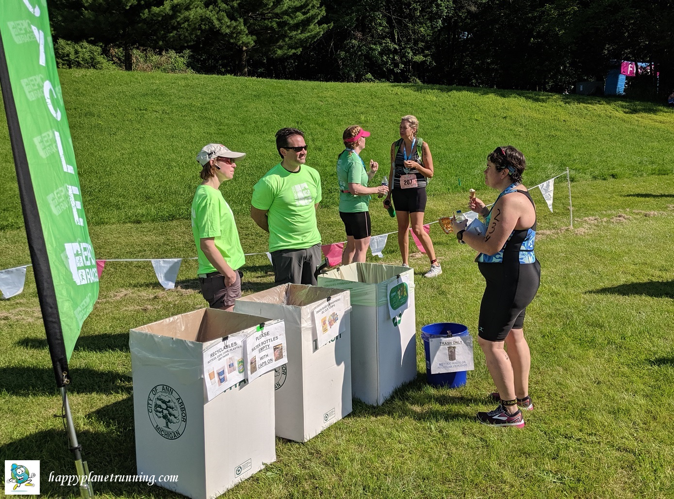 Tri Goddess Tri 2019 - Green Team talking with an athlete
